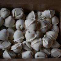 Pelmeni Frozen · Our chicken and pork dumplings. Frozen for your convenience, just cook in boiling water for ...