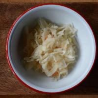 Pickled Cabbage · Russian style fermented cabbage with carrots and cranberries.