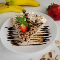 Banana Dreams · Nutella | Banana | Almonds | Dark chocolate syrup | Caramel syrup | Whipped cream | Chocolat...