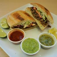Machaca ( Shredded Beef) Torta · Shredded Beef with Bell Peppers and Onions, Egg, Lettuce.