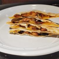 Shrimp Quesadilla · Mixed Cheddar and Monterrey cheese, Shrimp, and specialty salsa. Folded into a Flour Tortill...