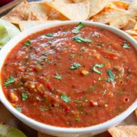 Chips & Salsa · Corn Chips topped with Pico De Gallo