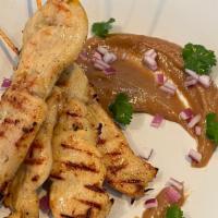 Chicken Satay · Grilled chicken skewers marinated with mixture spice, served with peanut sauce.