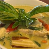 Green Curry · Choice of meat, eggplants, green bean, bell peppers, basil leaves and green herbs curry mixe...