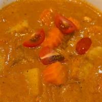 Massaman Curry · Choice of meat, potatoes, peanuts, carrots and curry peanut sauce herbs mixed with coconut m...