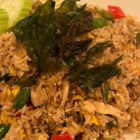 Basil Fried Rice · Stir-fried rice with choice of meat, egg, basil leaves, onions, mushroom garnish with crispy...