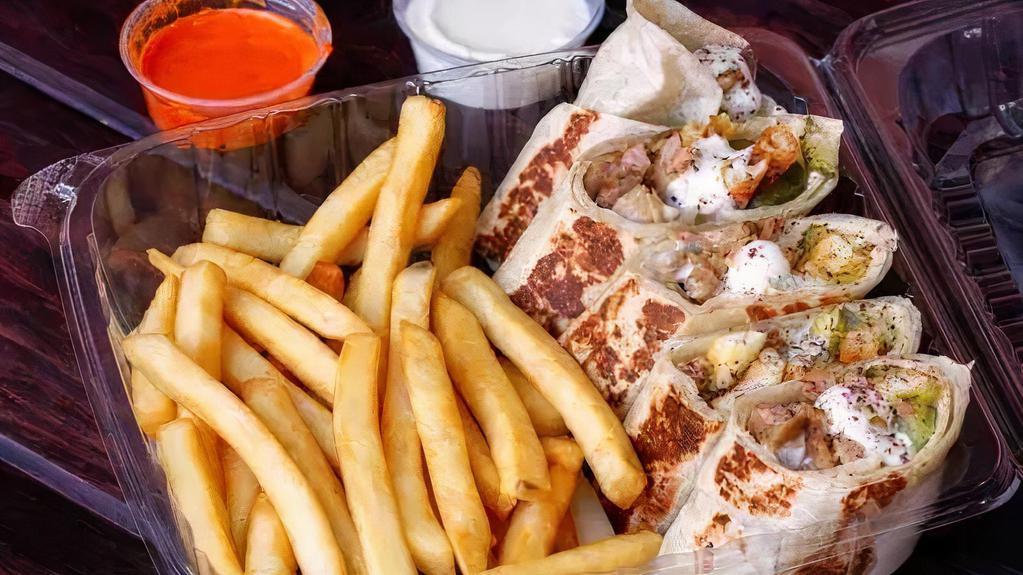 Chicken Arabi With Fries · Lettuce, tomatoes, onion, chicken, pickles, fries, garlic & hot sauce on saj bread.