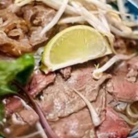 Pho Tai Nam · Slices of ribeye and flank, pho broth, and rice noodles