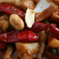 Kung Pao Chicken · Diced chicken, red bell peppers, onion, peanuts, chili pods, and house sauce.