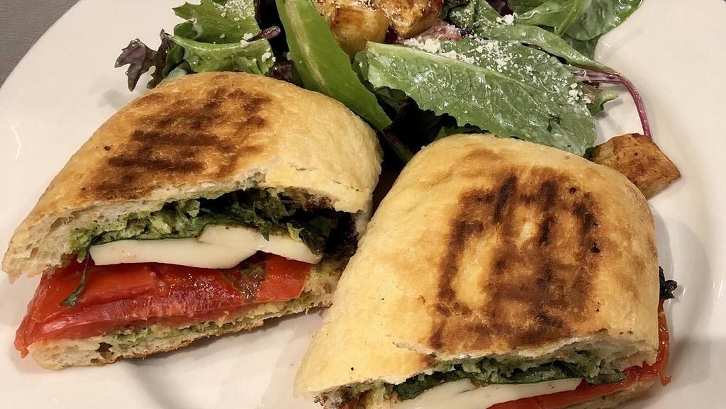 Santa Fe Chicken Panini · blackened chicken, jack cheese, roasted red peppers, caramelized onion, avocado, chili pepper aïoli, crisp country bread. 1050 | 940 cal.