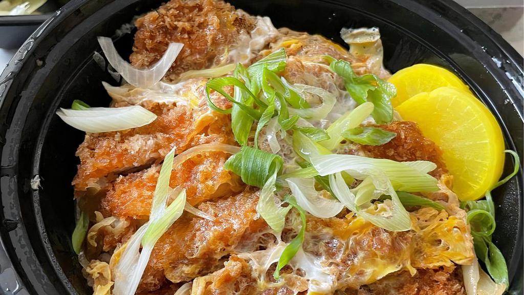 Katsu Don · Deep-fried pork or chicken cutlet with soft egg. Served with miso soup.