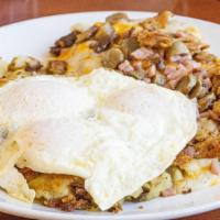 Loaded Biscuit · One biscuit smothered in sausage gravy and topped with cheddar/ jack cheese, chopped ham, ba...
