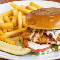 California Ranch Club · Crispy, fried chicken breast, lettuce, tomato, bacon, avocado, and ranch on a toasted brioch...