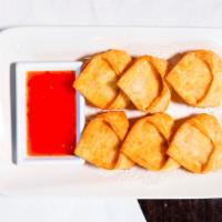 Crab Rangoon (6 Pc) · Crab and cream cheese stuffed wonton skin deep fried and served with sweet and sour sauce.