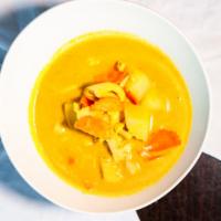 Yellow Curry (Kang Ka Ree) · With potatoes, carrots, and coconut milk. Choice of: chicken, pork, beef, vegetables, or tof...