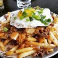 Gorgonzola Waffle Fries · Jack it up with pulled pork, bacon, tomato, green onion, chipotle sour cream for an addition...