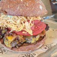 The Fatted Sow · Bacon, bourbon bacon slaw, bacon whiskey jam, Tillamook cheddar, pickle, marinated tomato, s...