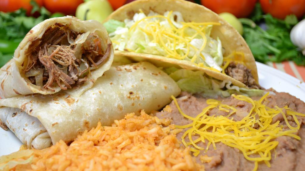 #6. Beef Burrito & Beef Taco · Shredded Beef Burrito with Bell Peppers, Onion and Tomato, Shredded Beef Taco with Lettuce and Cheese. Rice and Beans included
