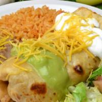 #19. Chimichanga Plate · Shredded Beef mixed with Onion, Tomato and Bell Peppers, Beans and Cheese, Guacamole, Sour C...