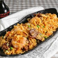 House Special Fried Rice · Served with shrimp, beef and chicken. 
Best Seller.