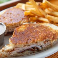 Smoked Turkey, Bacon & Swiss · Smoked turkey, Swiss cheese, and crispy bacon on grilled sourdough bread. Served with honey ...