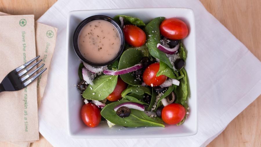 Spinach Salad · Fresh spinach, romaine mix, feta, red onion, black olives, tomatoes, and choice of dressing.