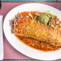 Carne Asada Burrito · Served with rice and beans, topped with guacamole.