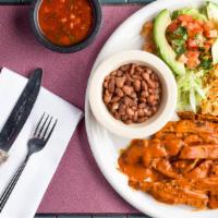 Pollo En Chipotle · Chicken marinated in our special chipotle sauce. Served with rice, whole beans, avocado and ...