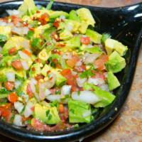Mexican Guacamole · Diced avocado mixed with onions, tomatoes, cilantro and lime.