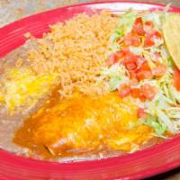Santa Fe Combination · Enchilada, chile relleno, taco and tamal.
