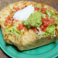 Fajita Taco Salad With Shell · Served with chicken or steak, bell peppers onions and mushrooms, lettuce, cheese guacamole a...
