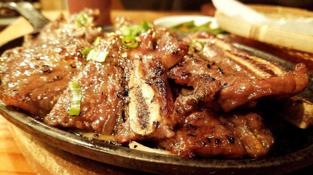 La Galbi · Specially marinated short ribs served over sizzling onion.