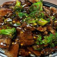 Spicy Steak & Broccoli Rice Bowl · Steak, broccoli, garlic, rice and Sam's spicy Teriyaki sauce.