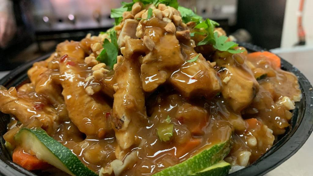 Thai Peanut Bowl · Your choice of chicken or steak with wok'd veggies (zucchini, carrots, cabbage, green bell peppers, and broccoli) , cilantro, chopped peanuts and Thai peanut sauce. Served over rice or noodles