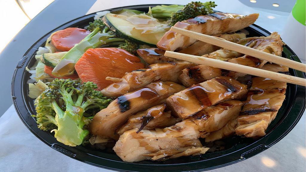 Chicken Breast Teriyaki Bowl · Grilled marinated chicken breast, with wok seared Japanese vegetables (carrots, broccoli, green bell peppers, cabbage) on a bed of your choice of white or brown rice topped with Samurai Sam's regular or spicy teriyaki glaze.