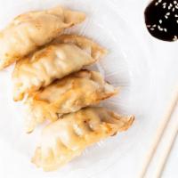 Potstickers (3 Per Order) · A blend of pork and vegetables wok-seared, served with a spicy soy dipping sauce.