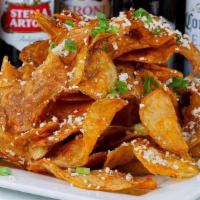 Hell Fire Chips · If you can’t handle it, don’t order it! No refunds! chips / buffalo sauce / bleu cheese crum...
