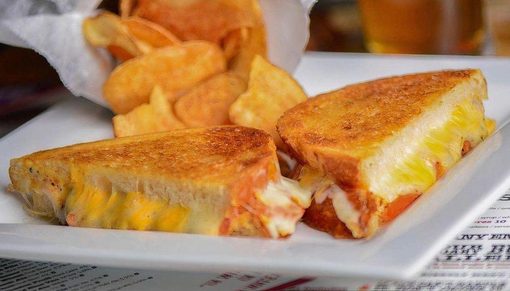 Grilled Cheese · American / swiss / provolone / tomatoes / sourdough. Add Bacon, Ham, Pastrami or Turkey for an additional charge.