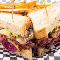 Cuban Reuben · House-cured pastrami, ham, bourbon mustard, Russian dressing, sweet and spicy house-made pic...