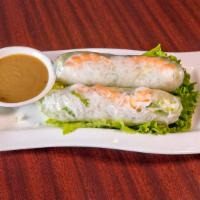 Shrimp Spring Roll · Gluten free. Shrimp, lettuce and  rice noodles wrapped in rice paper. Served with Thai peanu...
