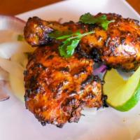 Tangdi Kebab · Chicken drum sticks marinated with coriander based spices cooked until perfection.