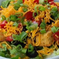 House Salad · Salad greens, cornbread croutons, toppings, and choice of homemade dressing.