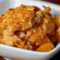 Cobbler · Amazing house-made cobbler. Fruit is seasonal, but peaches tend to rule the cobbler day!