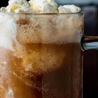 Root Beer Float · Our homemade root beer topped with two scoops of Arizona-made vanilla ice cream.