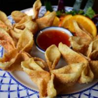 Crab Delight · wonton stuffed with snow crab, cream cheese
served with sweet chili sauce