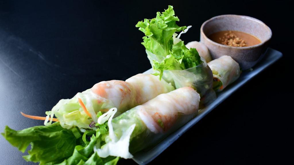 Fresh Rolls Prawns · green leaf & iceberg lettuce, cabbage, bean sprouts, carrots and cucumber wrapped in clear rice paper served with peanut sauce