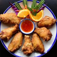Golden Wings · fried chicken wings served with sweet chili sauce