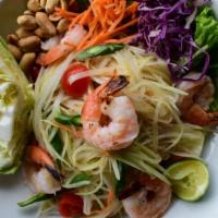 Prawns Papaya Salad · Shredded papaya, prawns, carrot, tomato, green beans, peanuts, and with lime dressing.