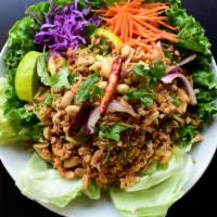 Khao Krob Gai · Crispy rice tossed with ground chicken, egg, red curry, cilantro, ginger, onions, peanuts, k...
