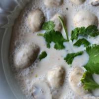 Tom Kha Soup · Hot and sour soup, coconut milk, lemongrass, kaffir lime leaf, galangal, mushrooms, and cila...